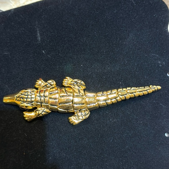 St. John Jewelry - Vintage St. John alligator crocodile gold-toned brooch.